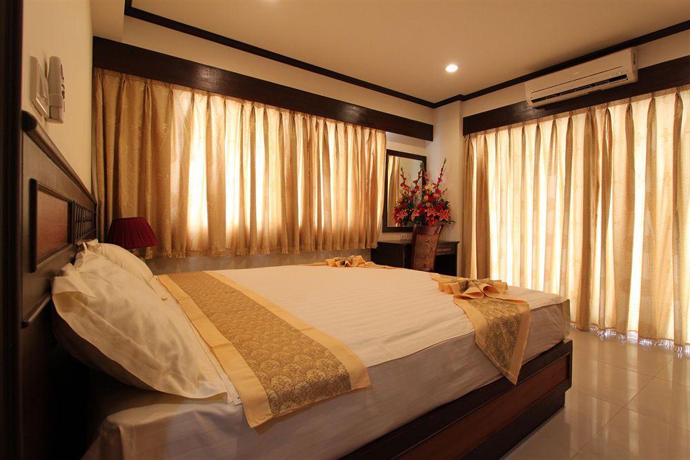 Miloft Sathorn Hotel - Sha Plus Certified Bangkok Exterior foto A bedroom at the hotel